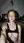 Redhead glasses desk selfie flash