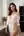 Over shoulder kitchen dress glance