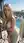 Blonde rooftop cleavage in dress