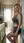 Blonde in sports bra kitchen pose