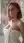 Towel-clad pink bob over shoulder