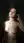 Wet brunette topless in shower