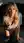 Young adult blonde cleavage table lean