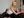 Platinum blonde on casting couch in white tank