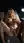 Nude blonde on dark terrace