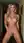 Blonde spreads pussy in hallway