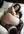 Curvy redhead reverse cowgirl on bed