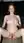 Young redhead nude on living room rug