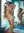 Topless blonde stretches in mirror