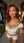 Redhead on knees in walk-in closet