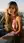 Curvy blonde nude balcony pose
