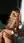 Blonde wavy hair nude bed pose