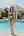 Heart-Shaped Sunglasses by the Pool