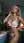 Curvy blonde lingerie pose in kitchen