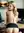 Débora Glances Back with Her Skirt Pushed Up at the Desk