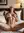 Young adult self-pleasure on bed