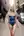 Slim blonde in blue satin bodysuit