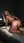 Blonde on all fours looking back