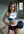 Cheerleader crop top and pom-poms