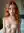 Redhead nude over shoulder glance