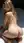 Blonde on all fours looking back