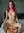 Redhead squats on thick dildo