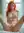 College-age redhead legs spread