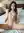 Petite Asian nude legs spread on bed