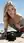 Blonde topless on sunny beach rocks