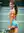 Brunette ponytail topless on tennis court