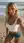 Blonde selfie on wet sand