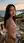 Curvy nude terrace view from behind