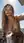 Young adult nude balcony selfie