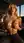 Blonde topless at office desk