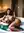 Larissa in a candlelit bath