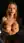 Blonde in bathtub, cupping breasts
