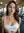 Gym mirror over-the-shoulder glance