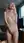 Slim nude body in living room
