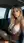 Young adult blonde in car lingerie