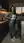 Young latina in kitchen at dusk