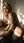 Curvy blonde bent over kitchen counter