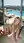 Young adult blonde on rooftop