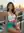Young Latina balcony sunset smile