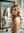 Nude blonde bathroom mirror glance