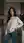 Kitchen fully clothed brunette pose