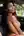 Tongue out topless car backseat