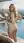 Blonde pulls shirt off rooftop