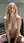 Blonde blue eyes office chair nude