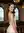 Slim backless dress on stairs