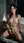 Athletic nude vibrator on marble floor